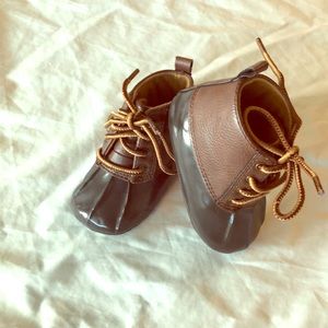 By: Trim-foot boy baby shoes.